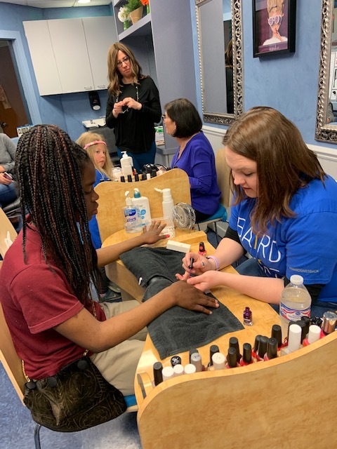 Side view of Cortney doing nails.jpg